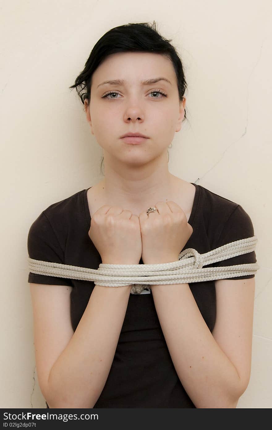 Beautiful Brunette Girl Tied With Ropes