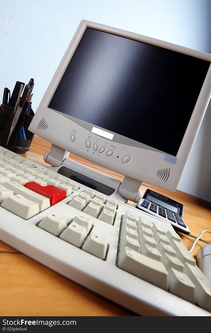 Keyboard and monitor at table