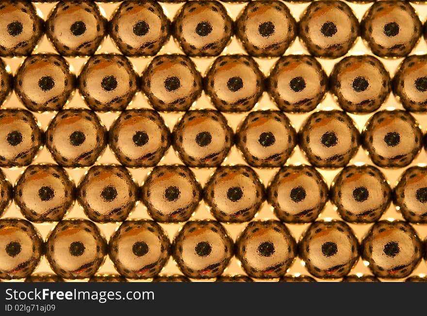 Shiny gold beads background