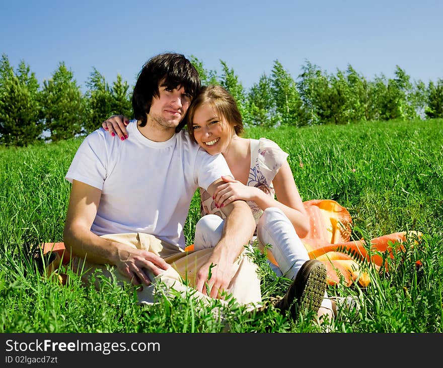 Boy and beautiful girl on grass. Boy and beautiful girl on grass