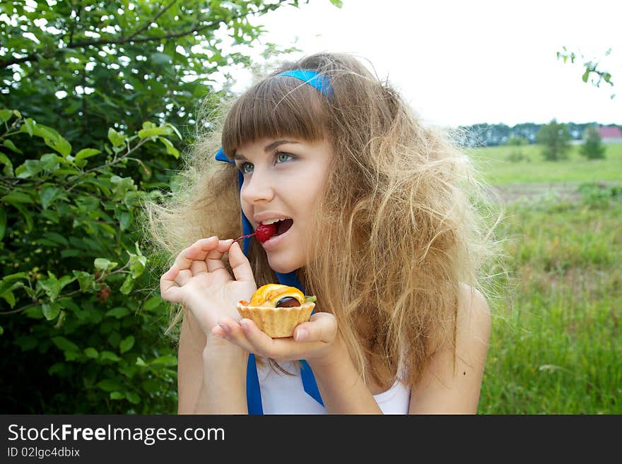 Beautiful Girl Holding Cake