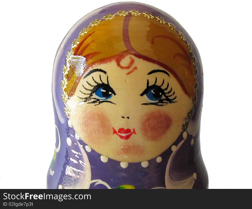 Close-up of a original russian doll on white background. Close-up of a original russian doll on white background