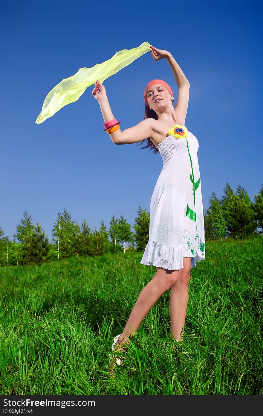 Nice girl in white dress with kerchief