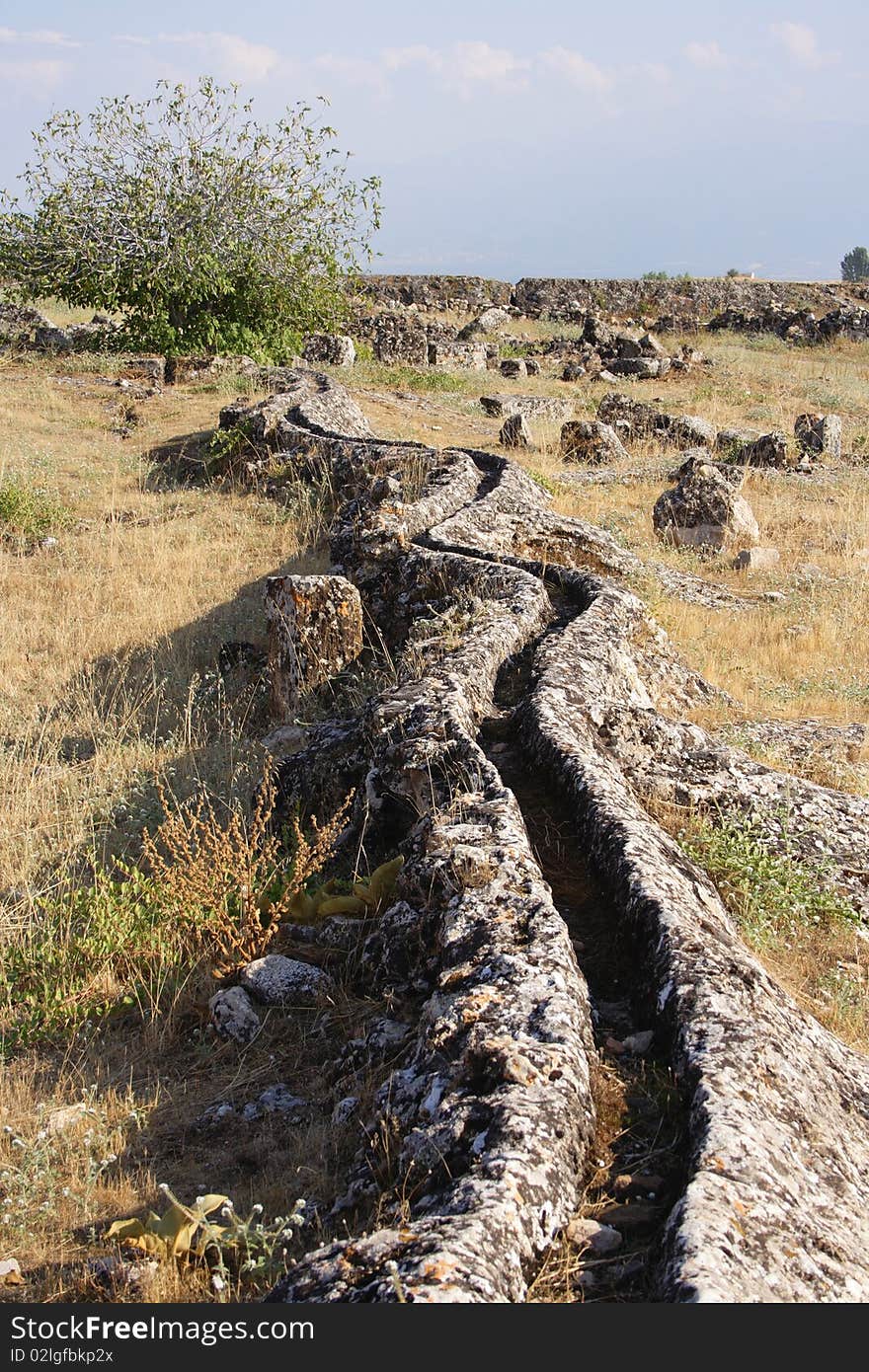 Old aqueduct - ruin of the antique city Hierapolis, Turkey. Old aqueduct - ruin of the antique city Hierapolis, Turkey