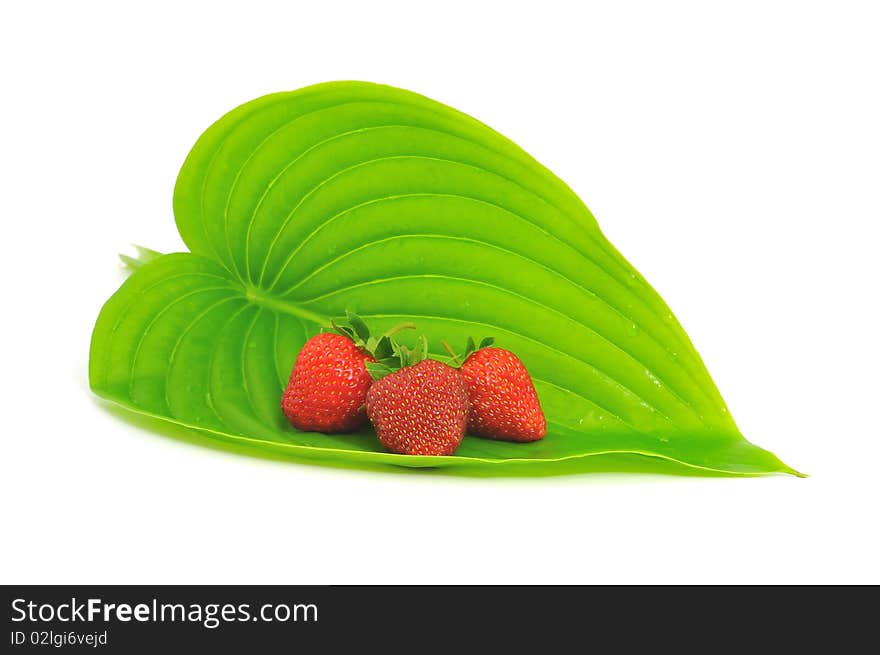 Strawberry with leafs isolated on white