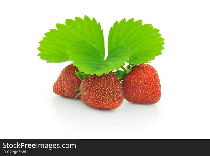 Strawberry with leafs isolated on white