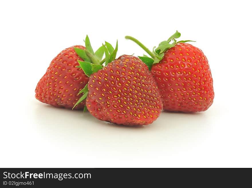 Fresh ripe red strawberries, isolated on white with soft shadow