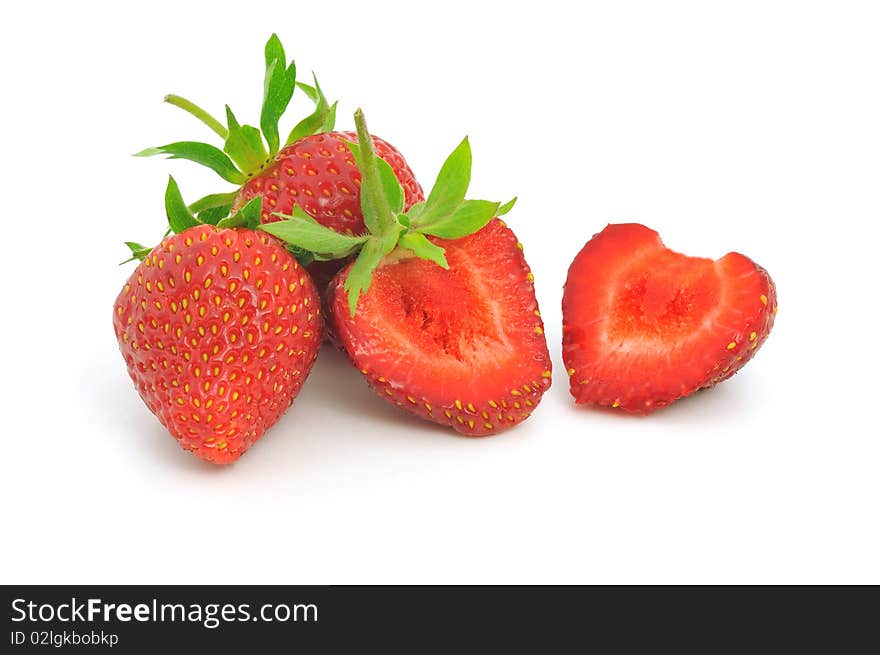 Group of fresh strawberries on white