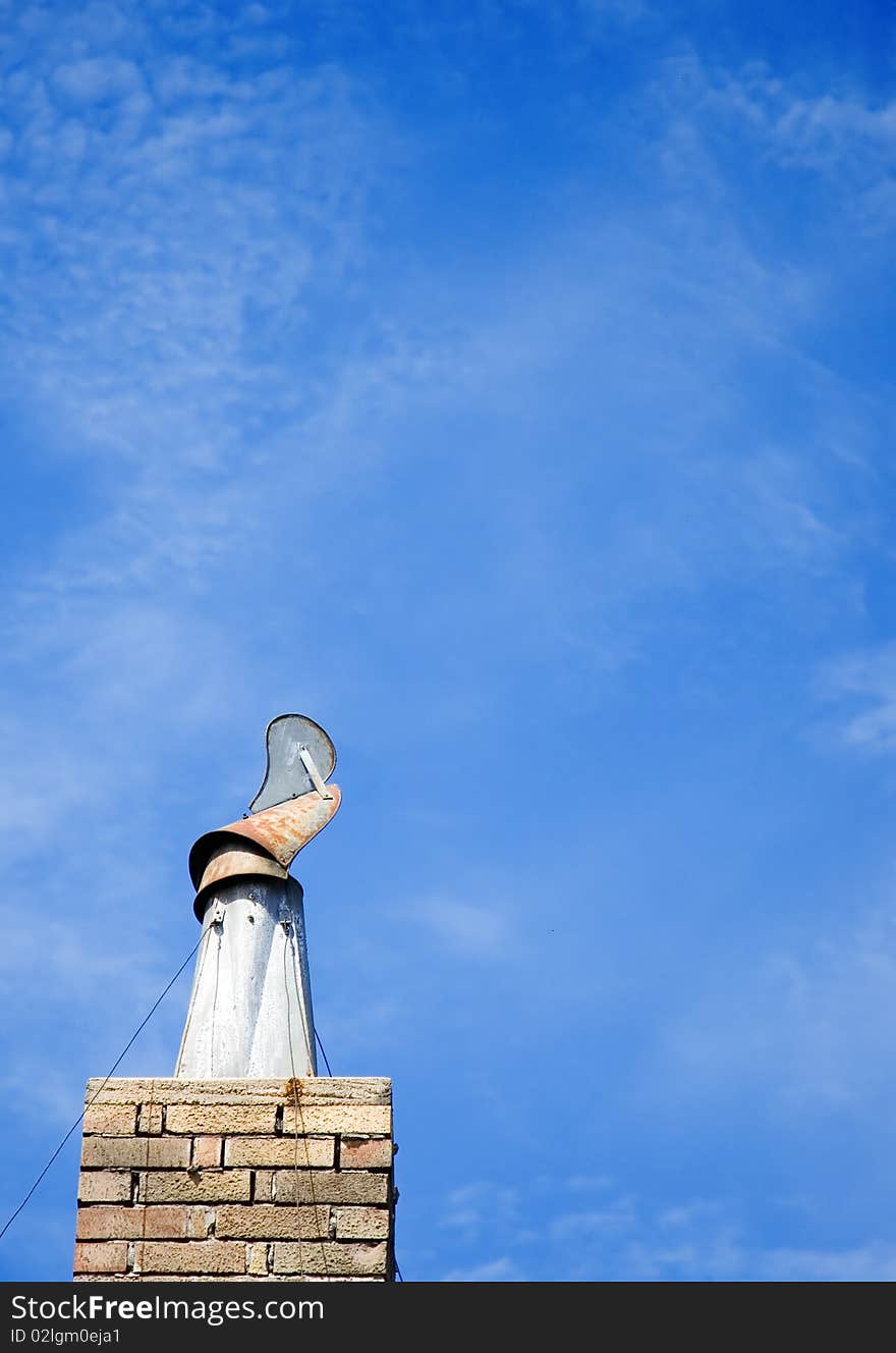 Chimney on top of a roof. Chimney on top of a roof