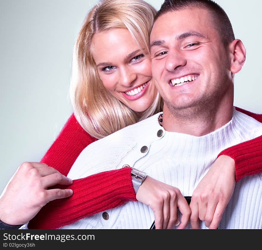 Young Loving Couple Huggging And Smille