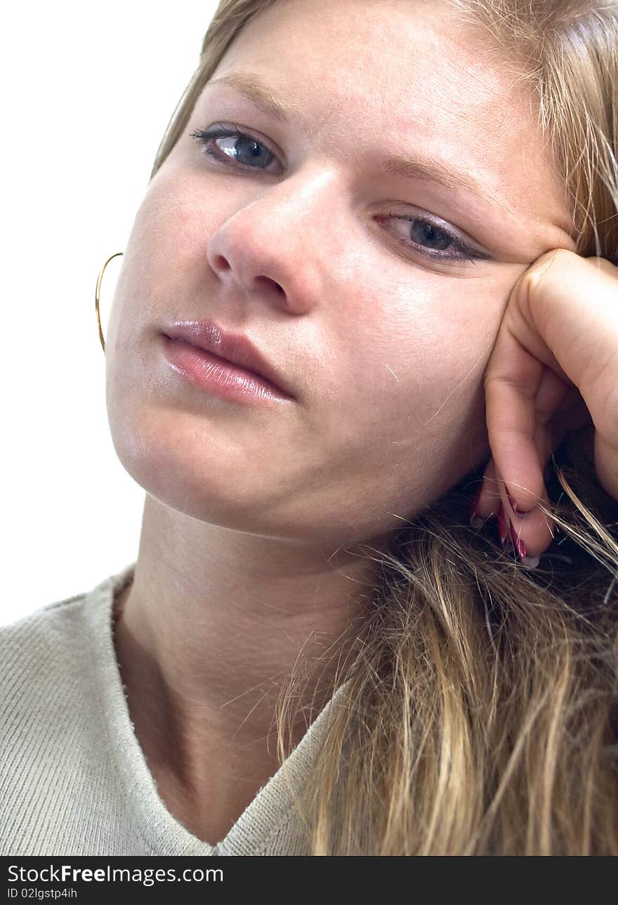 Portrait of a thoughtful girl isolated over white background