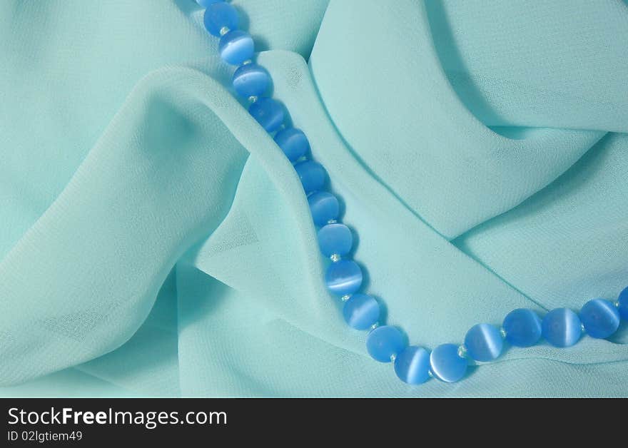 Smooth elegant and very nice and beautiful silk fabric with pearls ,background. Smooth elegant and very nice and beautiful silk fabric with pearls ,background