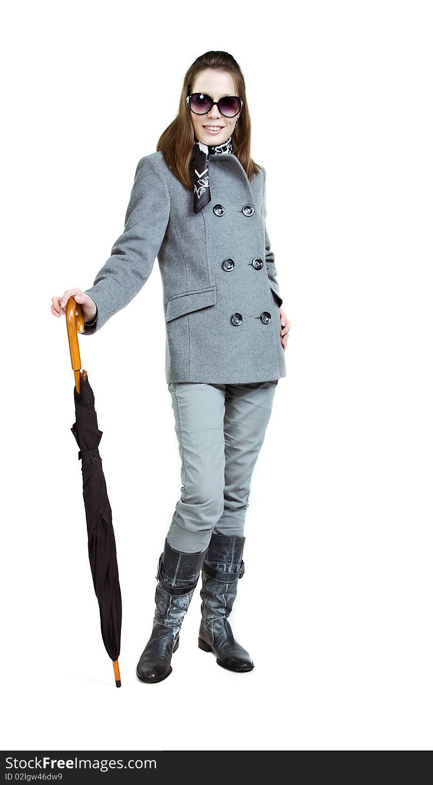 Fashionable Girl In An Autumn Coat With Umbrella