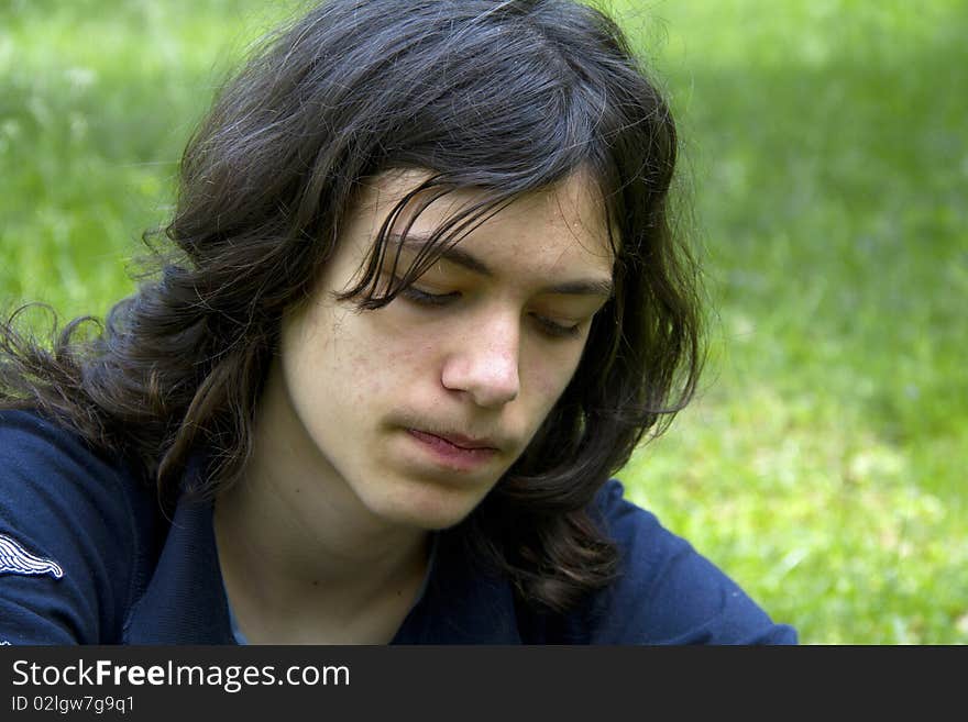 Portrait of a boy with long hair. Portrait of a boy with long hair