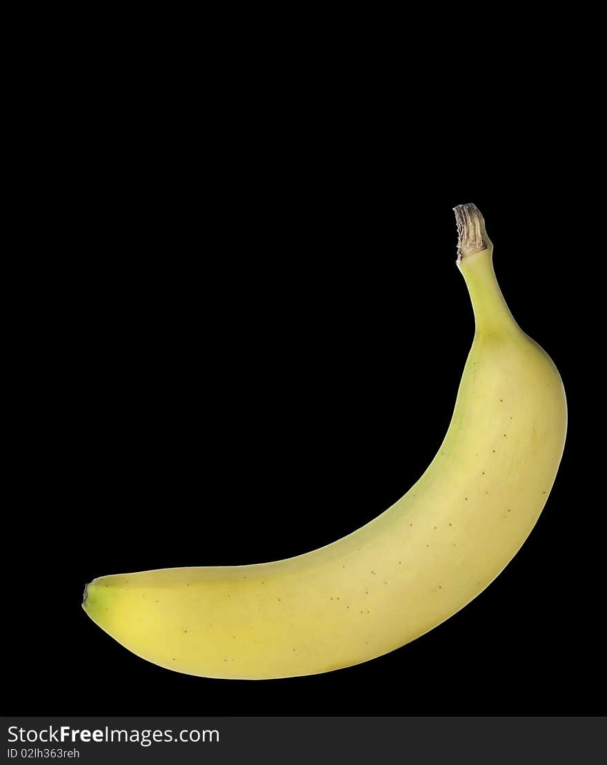 Banana isolated on black background.