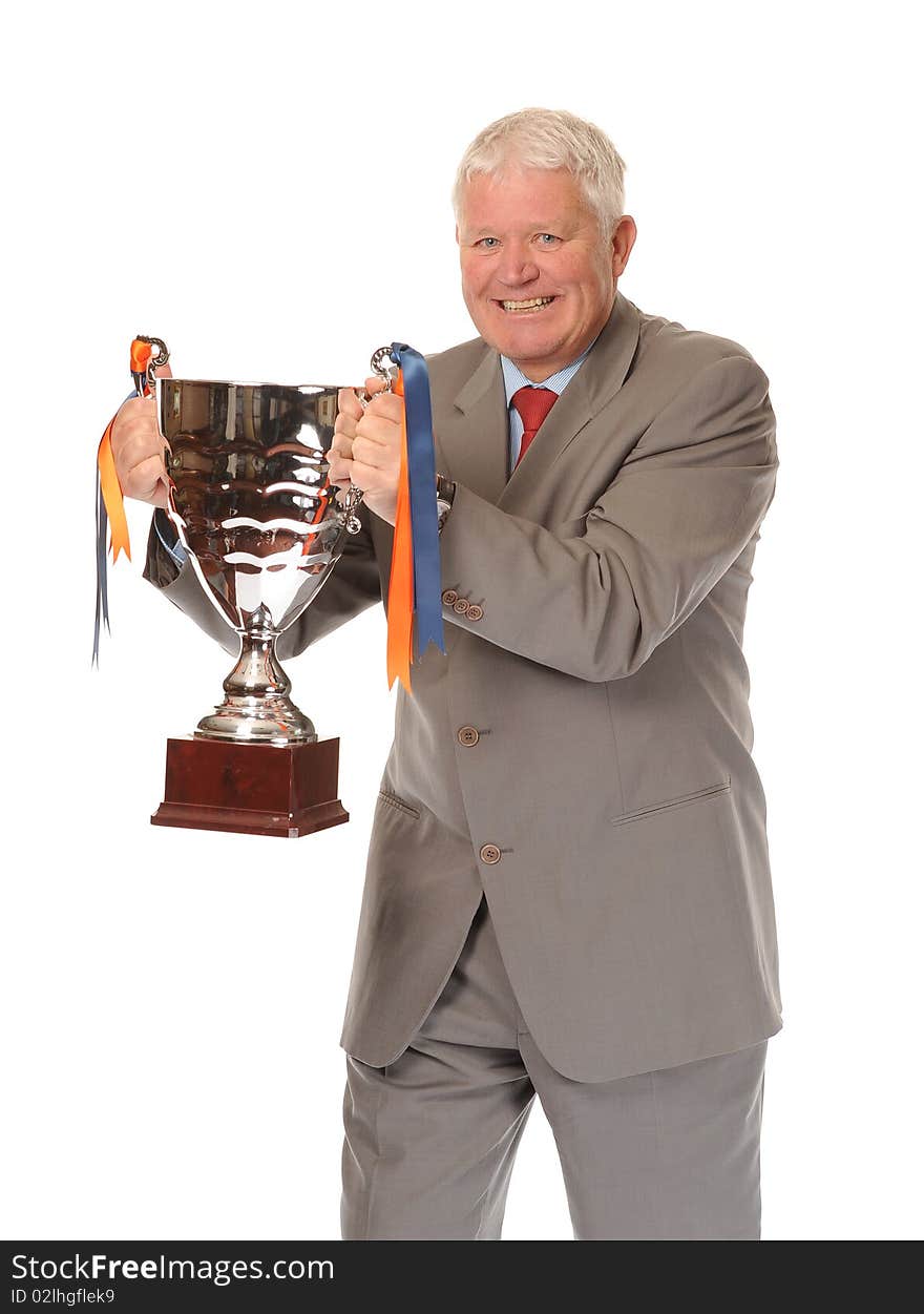 Successful mature business man on white background, holding trophy. Successful mature business man on white background, holding trophy