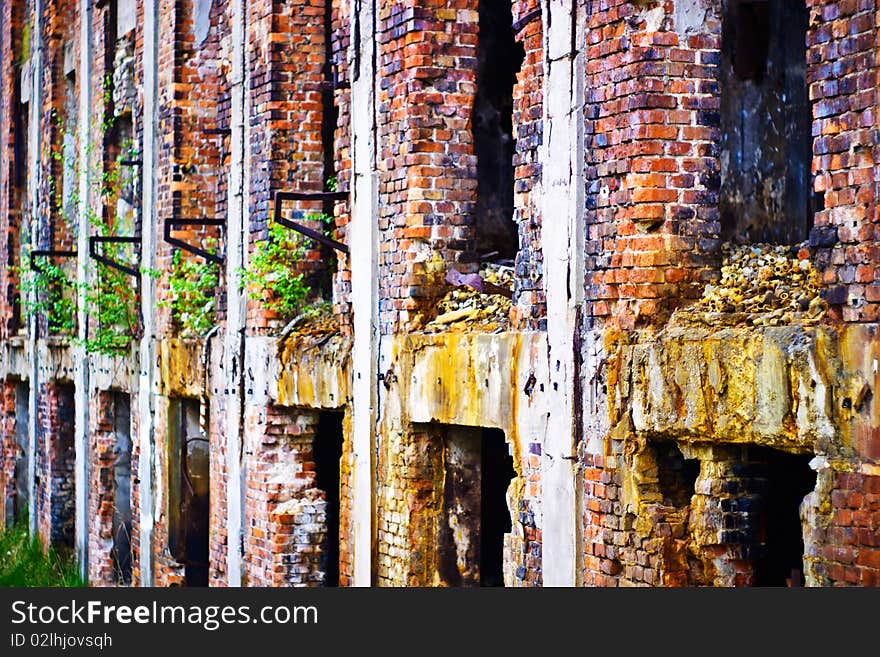 Wide angle view of an old wall abandoned factory building