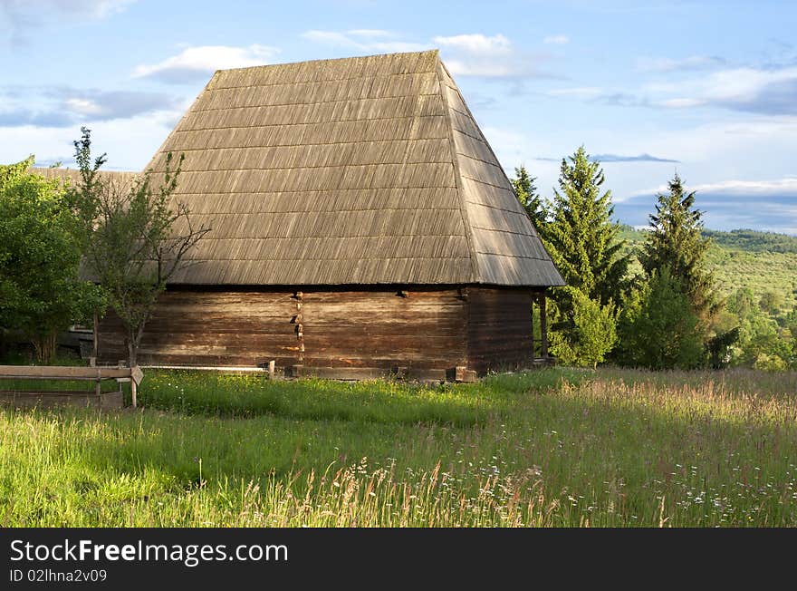 Traditional village with wooden houses covered with withered plants. Traditional village with wooden houses covered with withered plants