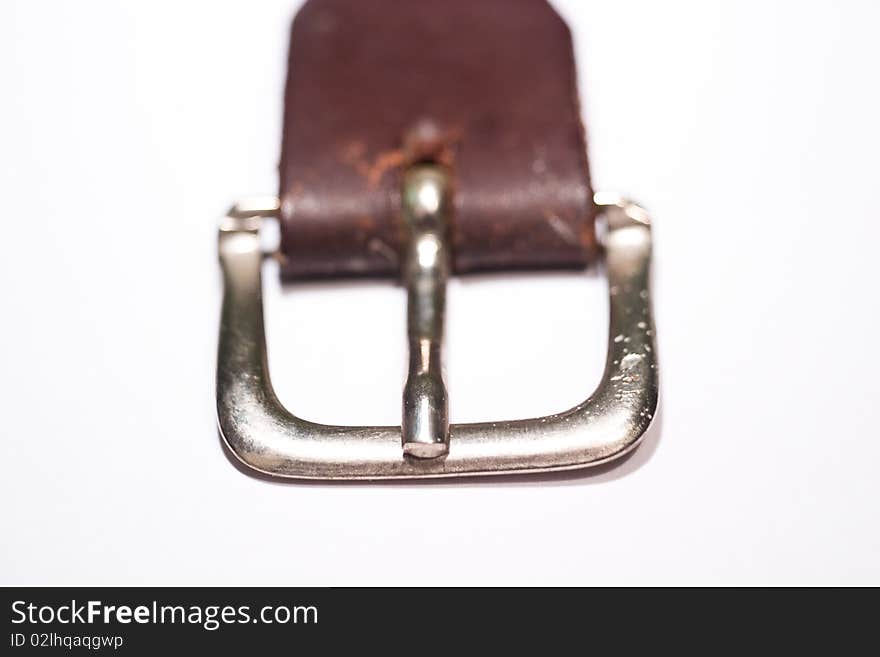 Close up of old leather belt on white background