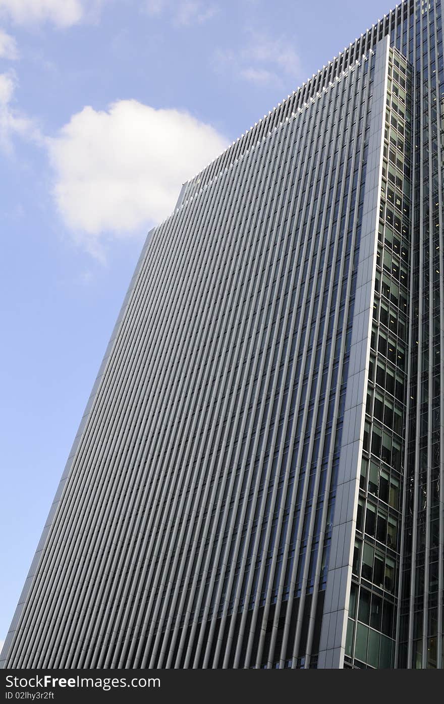 Vertical Buildings With Blue Sky In Background