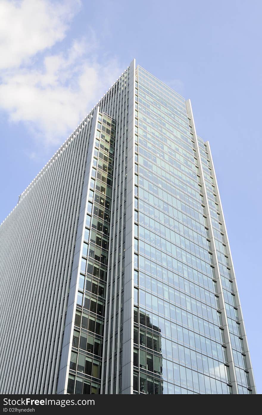 Vertical buildings with blue sky in background