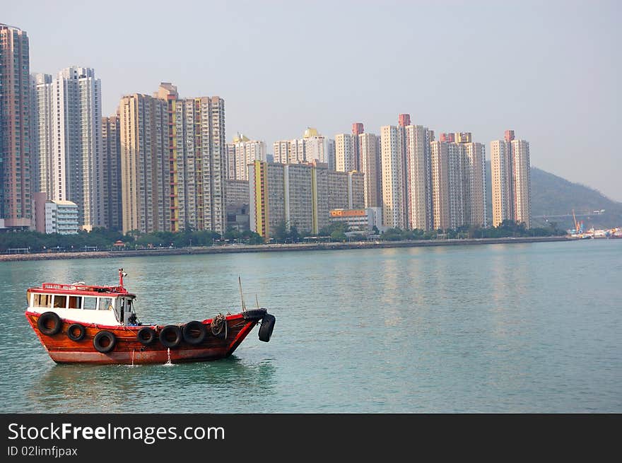 The boat in the bay of the city. The boat in the bay of the city