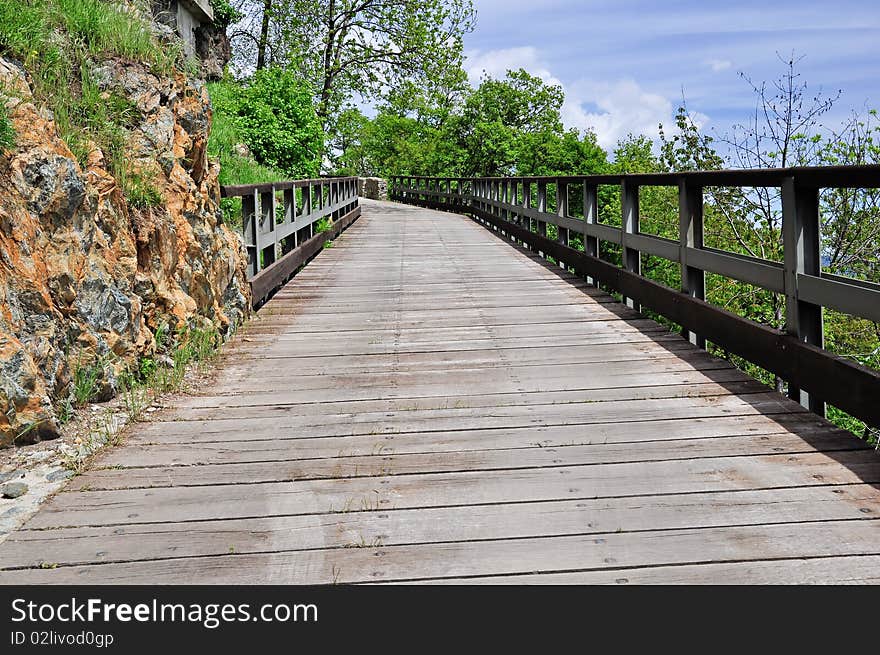 Old mountain road with iron guards