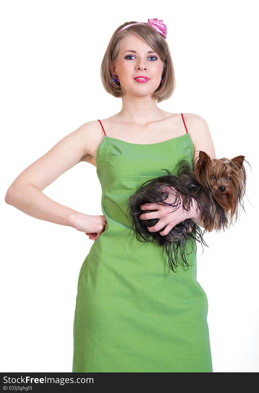 Beauty young woman in green dress with dog