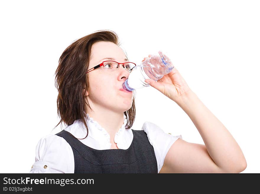 Young Female Drinks Water From Plastic Bottle