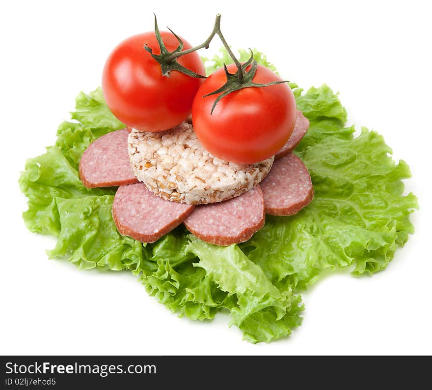 Sandwich with sausage, tomatoes and salad