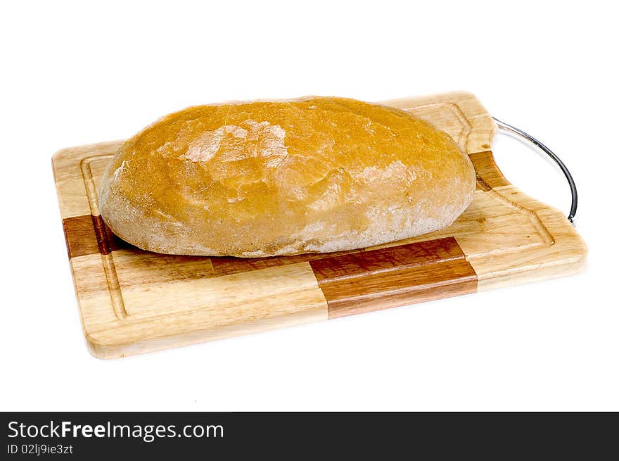 Fresh bread on a wooden board