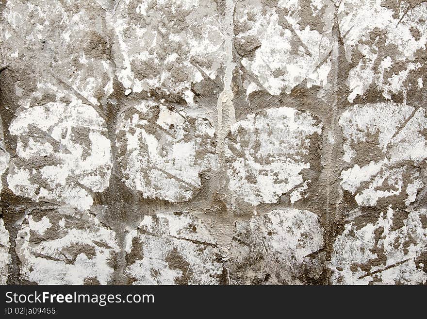 Concrete wall marked on squares in the manner of background