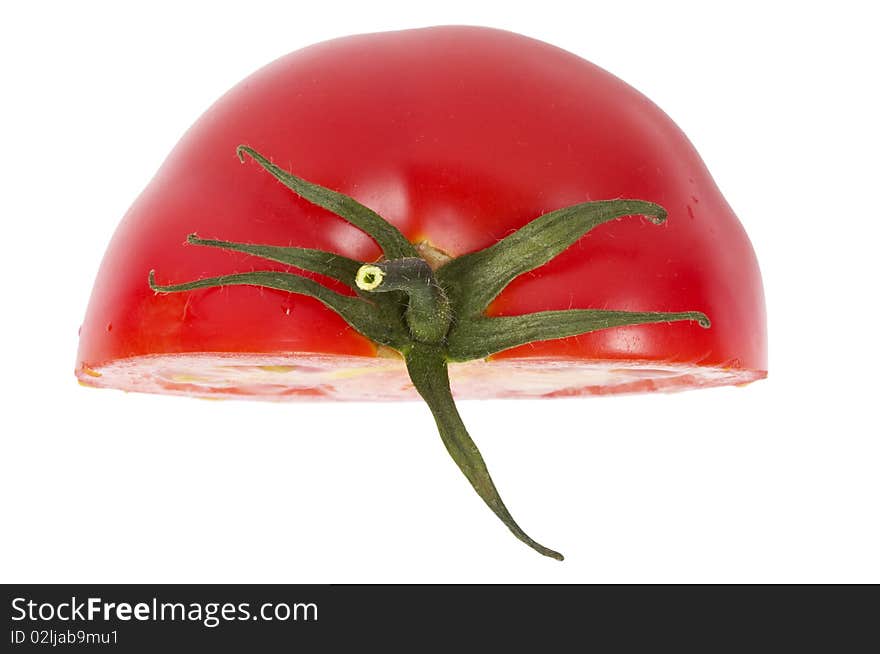 Tomato's half macro shot isolated over white background. Tomato's half macro shot isolated over white background