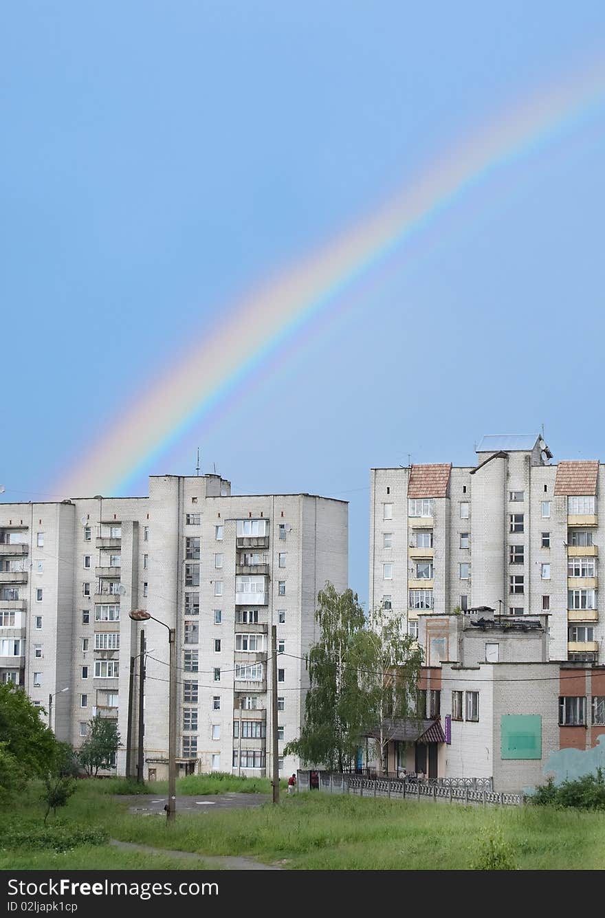 Rainbow on a background houses