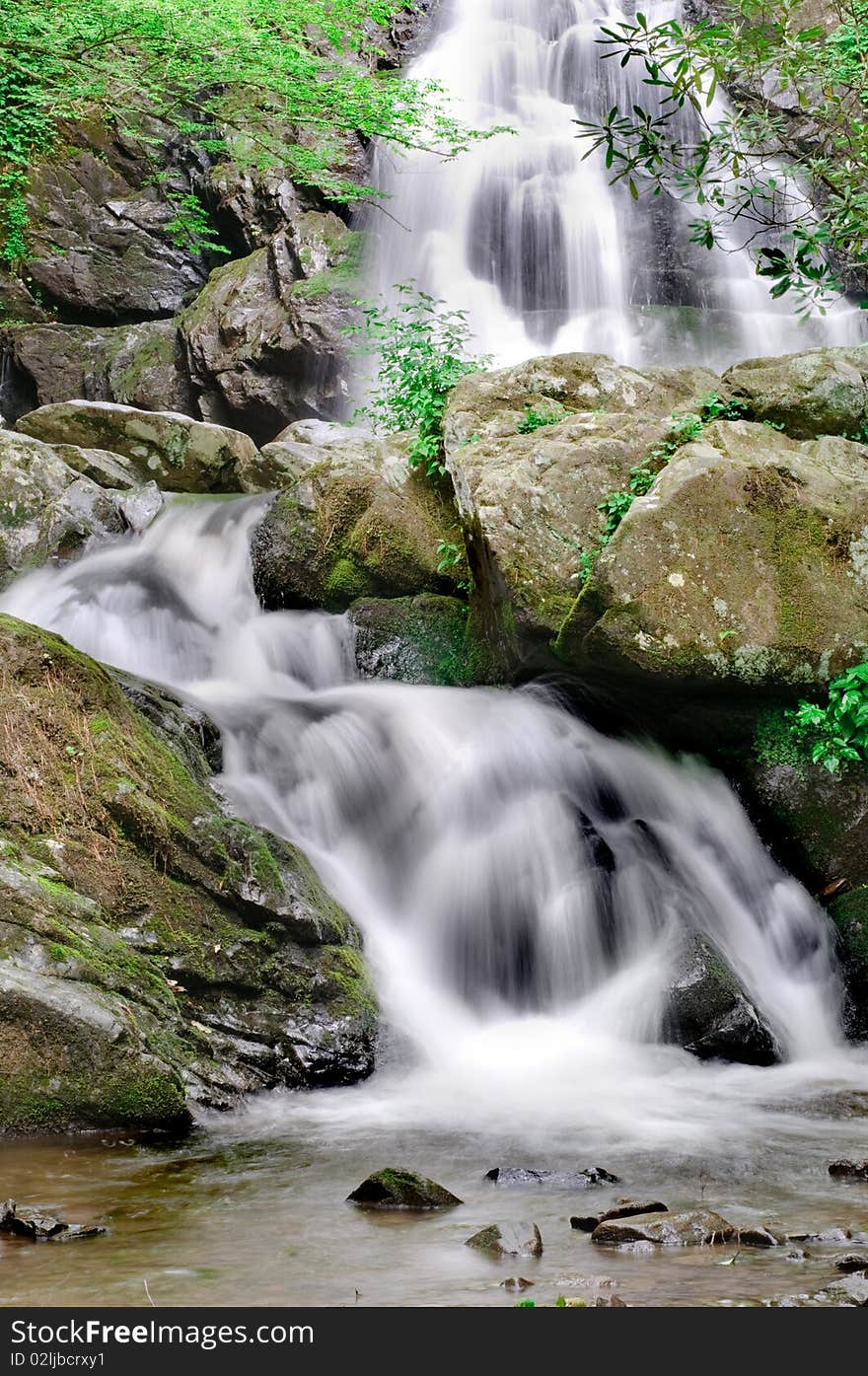 Beautiful Spruce Flat Falls in Great Smoky Mountains Natonal Park, after the spring rains. On the border of North Carolina and Tennessee. Beautiful Spruce Flat Falls in Great Smoky Mountains Natonal Park, after the spring rains. On the border of North Carolina and Tennessee.