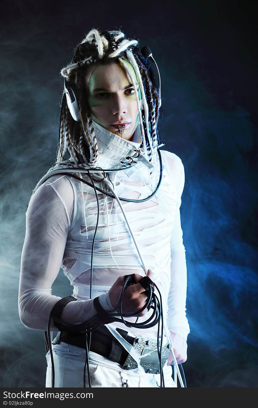 Shot of a futuristic young man with wires. Shot of a futuristic young man with wires.