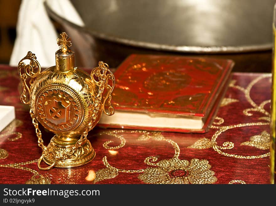 Holy Book, baptistery and a chrismatory found on an altar inside a Greek Orthodox church