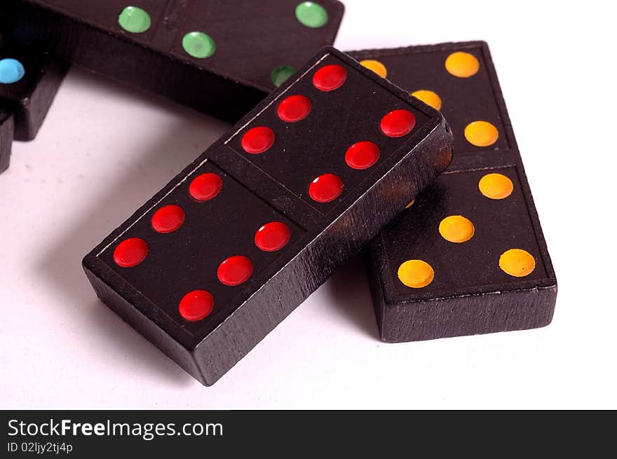 Colored domino tiles on white background