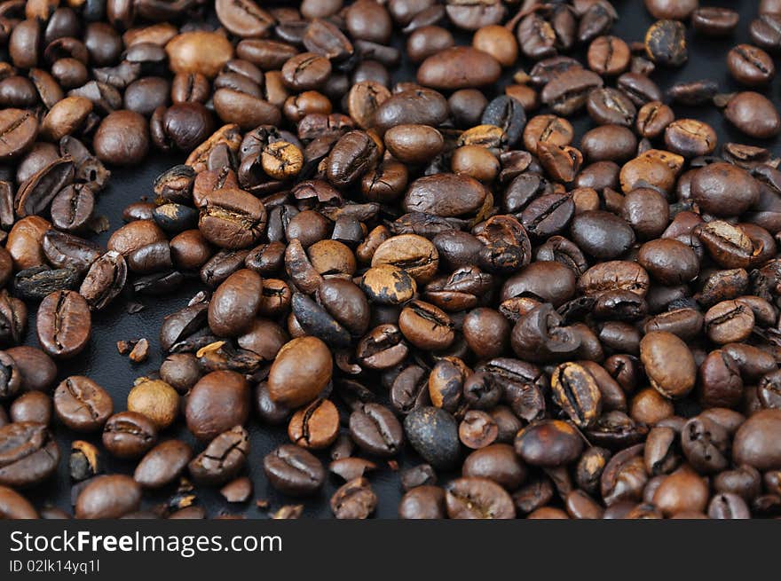 Coffee granules on black table