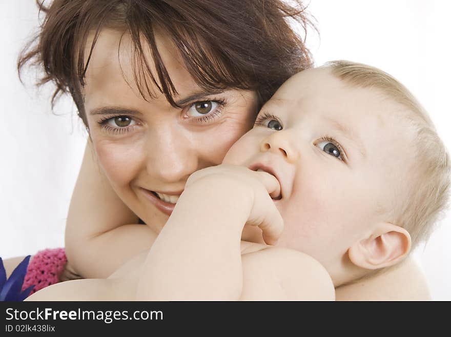 Mother And  Son Isolated On White.