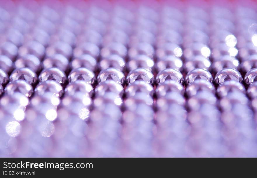 Shiny pink beads background