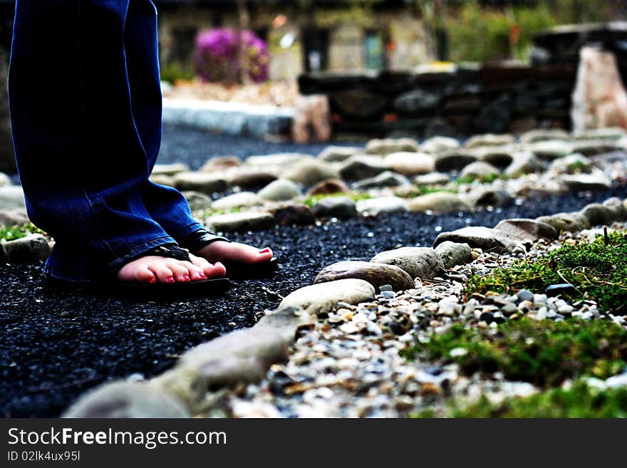 Feet on a stone path