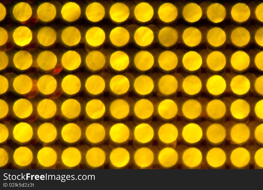 Blurry pattern of yellow decoration lights. Blurry pattern of yellow decoration lights.