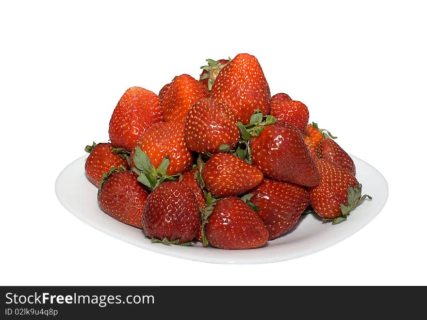 Strawberry on a plate on a white background