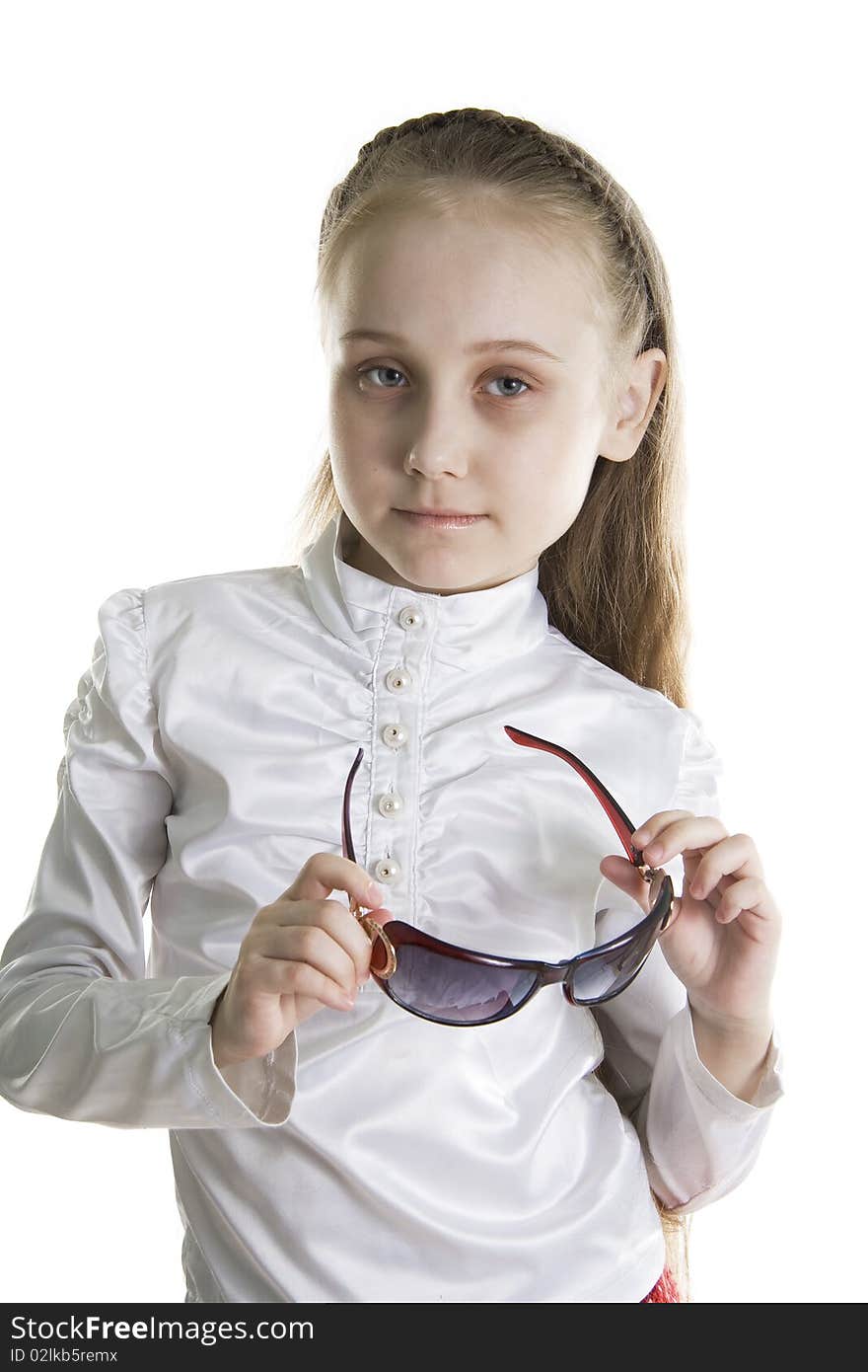 Fashionable serious girl with glasses.