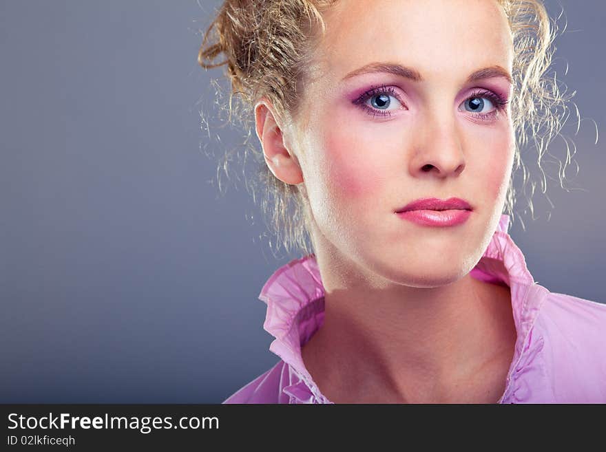 Portrait of beautiful lady on blue