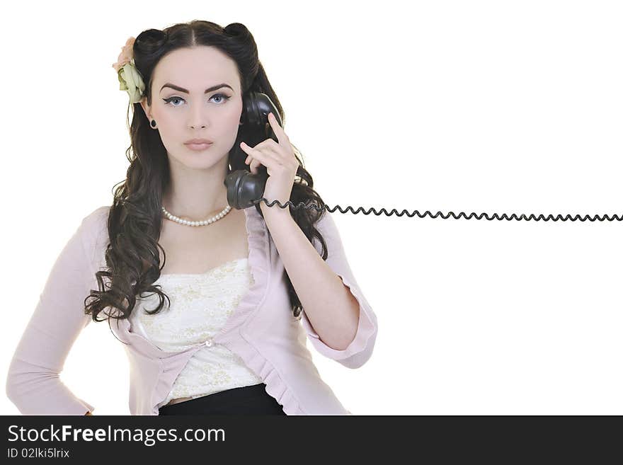 Beautiful young woman girl talking on old phone isolated on white in studio. Beautiful young woman girl talking on old phone isolated on white in studio