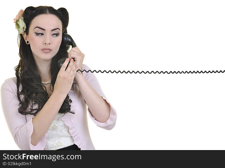 Pretty girl talking on old phone