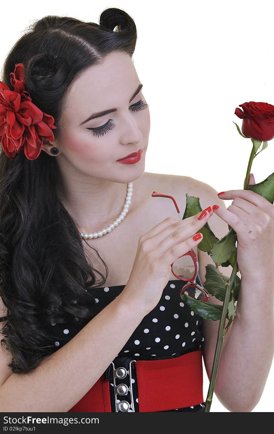 Beautiful young woman with rose flower isolated on white