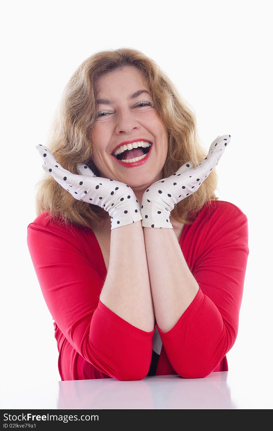 Portrait of a middle-aged woman in red with polka-dot gloves - isolated on white. Portrait of a middle-aged woman in red with polka-dot gloves - isolated on white